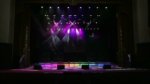 Bright beautiful rays of light on an empty stage before the concert.