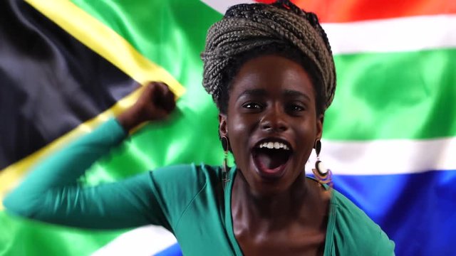 South African Young Black Woman Celebrating with South Africa Flag