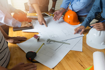 Engineer and Architect concept, Engineer Architects office team working and discussing with...