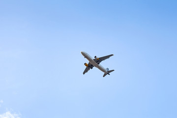 Airplane in the blue sky