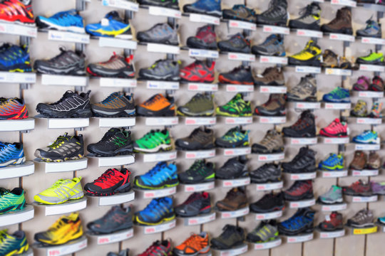 Image of sport shoes on showcase of sports shop