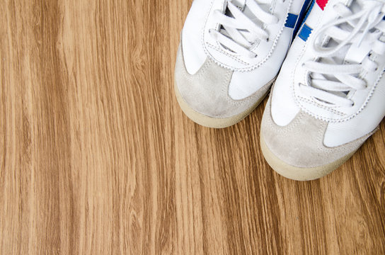 Sneakers on wooden background