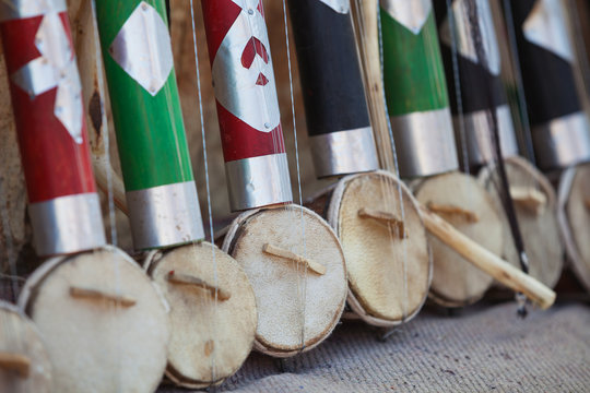 Cheap dotara - stringed musical instruments for sale at open market. India