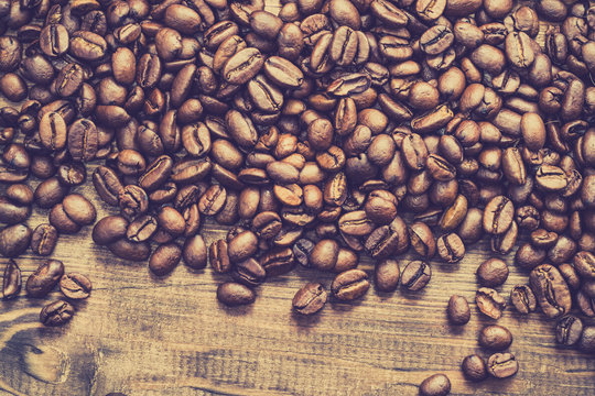 Black Coffee Beans Background, Coffee's Grain On Wooden Table, Overhead