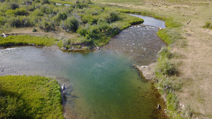 Aerial view of fly fisherman fishing in Montana river