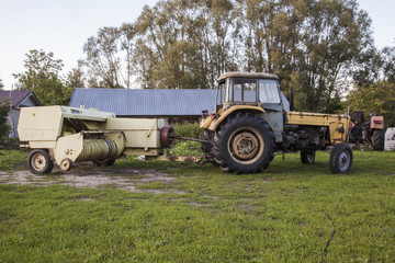 Tractor with hay and straw press