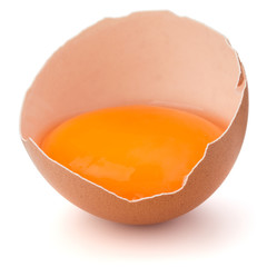 Broken egg  in eggshell half isolated on white background cutout