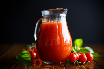 Homemade natural tomato juice in a decanter