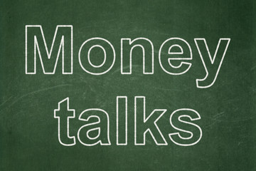 Finance concept: Money Talks on chalkboard background