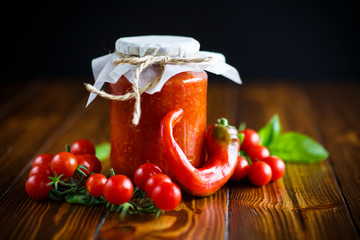 Homemade organic tomato sauce in a glass jar