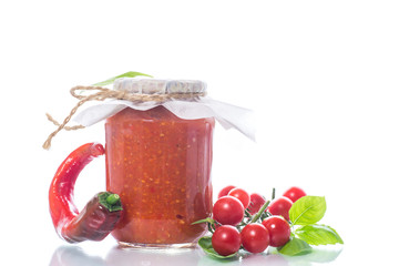 Homemade organic tomato sauce in a glass jar