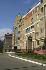 The facade of the brick house.