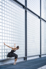 Fototapeta premium Attractive ballerina posing outdoors