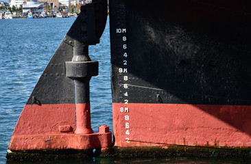 The view of the rudder of a stern of the ship which anchors at a harbor