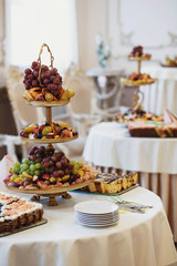 wedding buffet table with a variety of juicy fruits