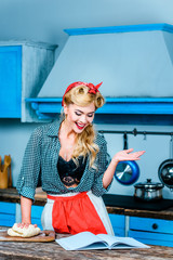 housewife reading cookbook