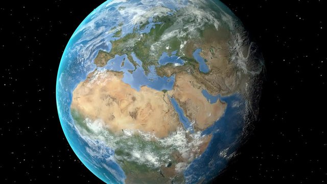 Night to day - rotating Earth. Zoom in on Italy outlined