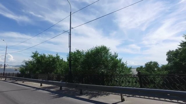 Riding over the bridge in Khabarovsk, the view through the glass.