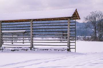 Traditional slovenian hayracks in winter.