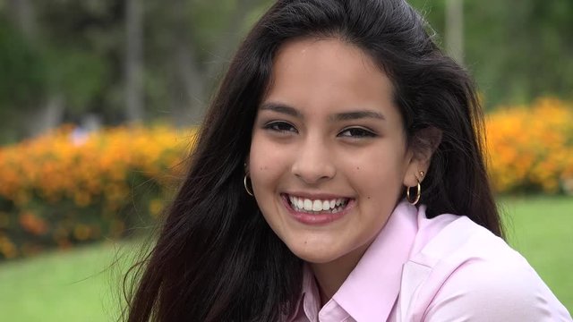Pretty Hispanic Female Teen Smiling