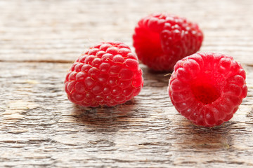 Fresh and sweet raspberries background. Selective focus