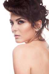 Fototapeta premium Model in studio photo isolated over white background. Perfect make up and hairstyle