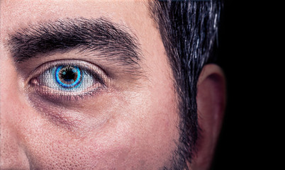 Closeup of a mans eye with binary code effect - concept