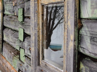 a reflection of winter in the window of the bath