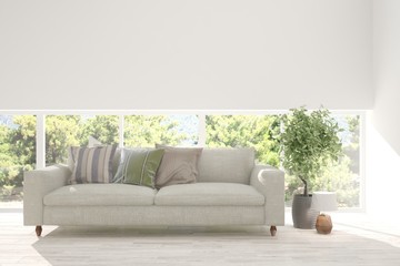 Idea of white room with sofa and summer landscape in window. Scandinavian interior design. 3D illustration