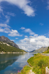 Naklejka na ściany i meble Fedaia Lake in Dolomites Alps, Italy