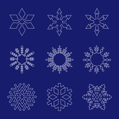 Set of white snowflakes line art  icons on blue background - 169809691