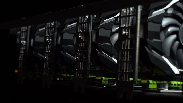 A powerful black computer farm for bitcoin mining with connected graphics cards