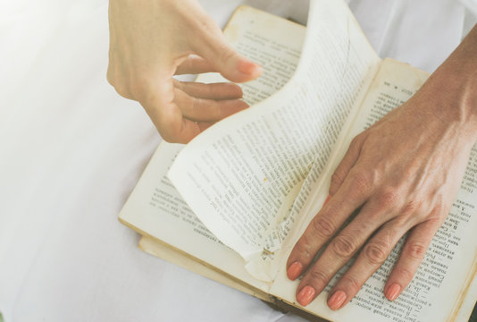 Woman's Hand Tear Out Book