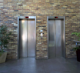 two elevators in a tall office building