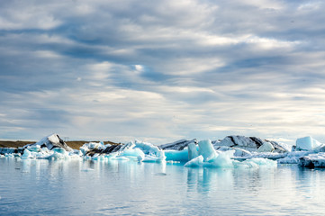 Floating icebergs in the glacial lake Jokulsarlon in Iceland