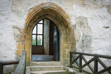 Fototapeta na wymiar .Arch with a door in a medieval castle Bezdez. Czech Republic.