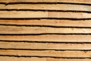 Horizontal lined slabs of a natural looking fence