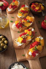 italian bruschetta with roasted peppers goat cheese olives