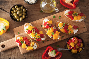 italian bruschetta with roasted peppers goat cheese olives