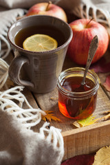 hot lemon honey tea warming drink scarf cozy autumn leaves