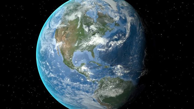 Night to day - rotating Earth. Zoom in on United States outlined