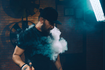 Man vaping an electronic cigarette