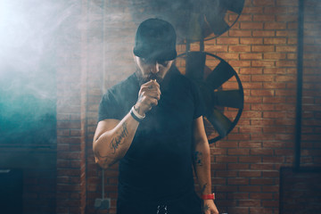 Man vaping an electronic cigarette