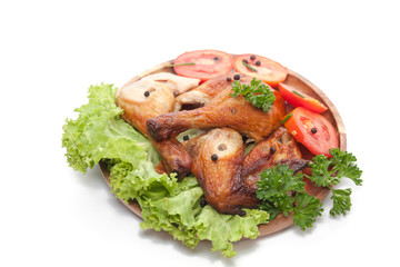 grilled wing and Drumstick chicken on wooden plate isolated on white background