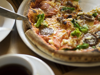 man taking pizza