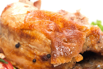 Roast chicken leg isolated on white background.
