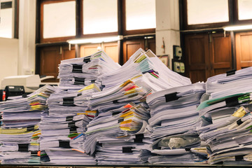 Paper documents stacked in archive