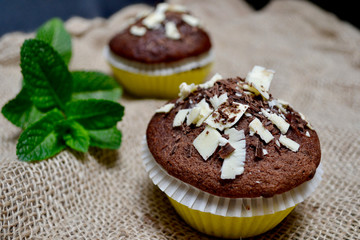 Close-up of Chocolate muffins on a Rustic Burlap Sack.
