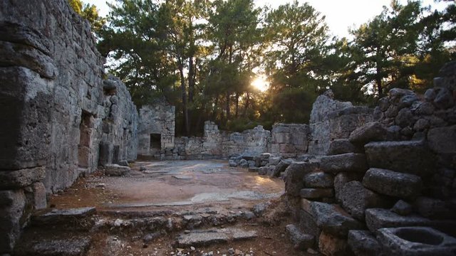 Stone ruins of an ancient fortress at sunset