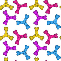 Yellow, pink, purple, blue heart shaped fidget spinners on white, seamless pattern. Colorful background with popular plastic toy. Package design. Bright multicolored print for kids and teenagers.